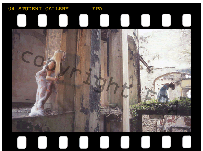 Creative photo of blonde model in a ruined castle wearing a beautiful dress